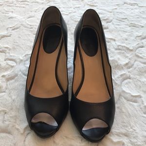 Cole Haan black leather peep toe pump